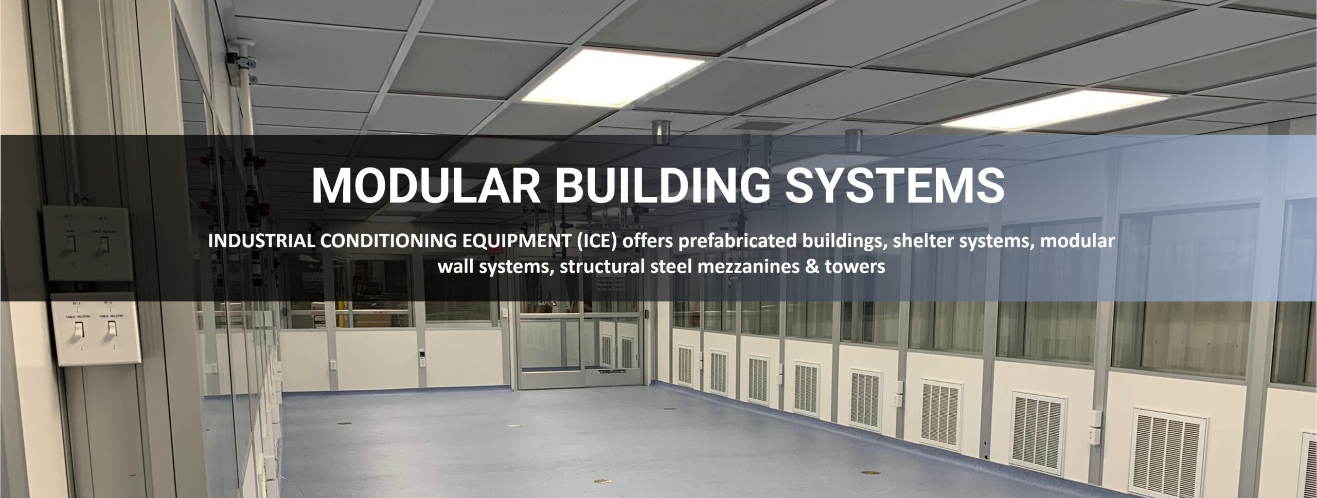 Empty modular building interior with blue floor